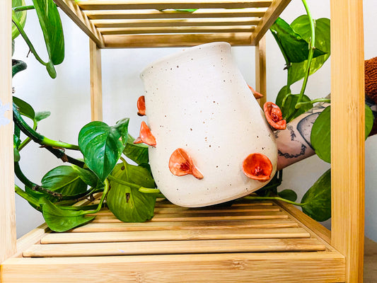 **vase: orange lillies