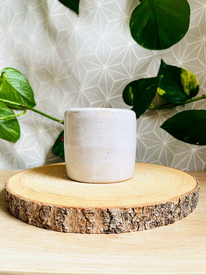 little pot & tiny cup: sand/snow
