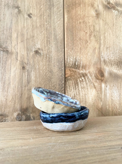 pair of pinch dishes