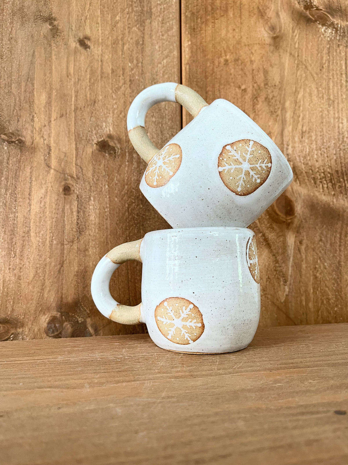 pair of festive hug mugs: snowflakes