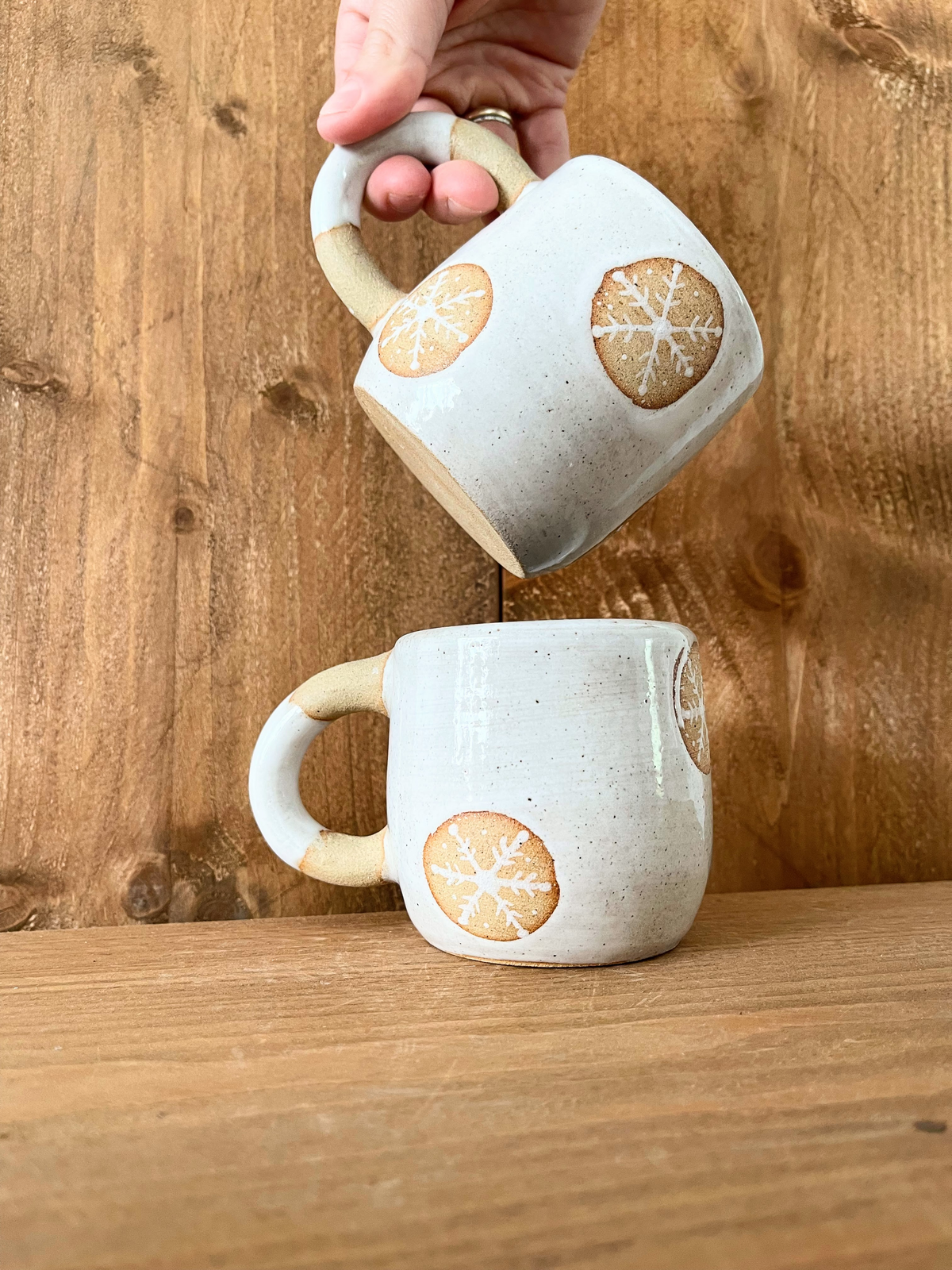 pair of festive hug mugs: snowflakes