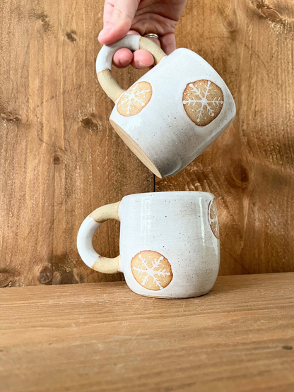 pair of festive hug mugs: snowflakes