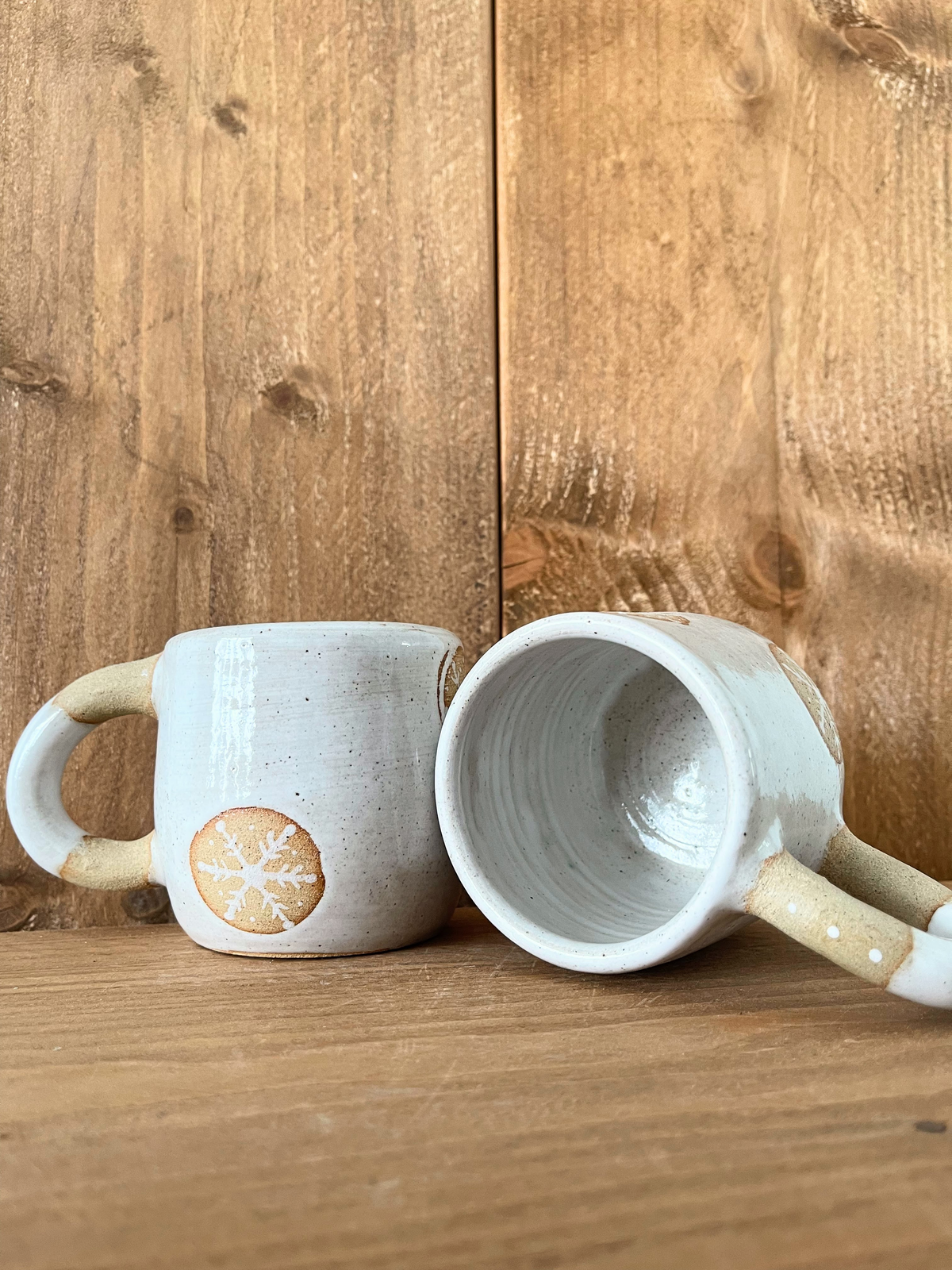 pair of festive hug mugs: snowflakes