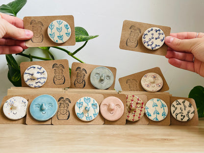 pin badges: various colours