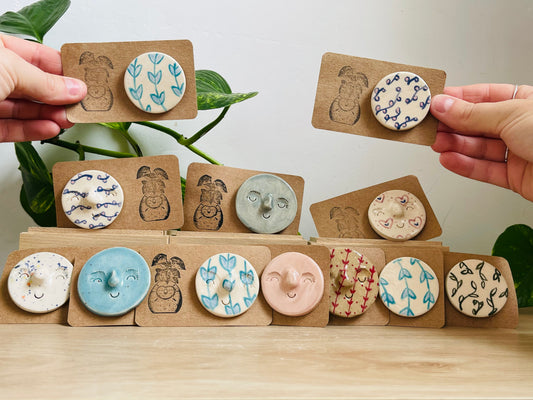 pin badges: various colours