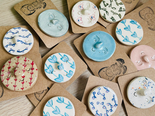 pin badges: various colours