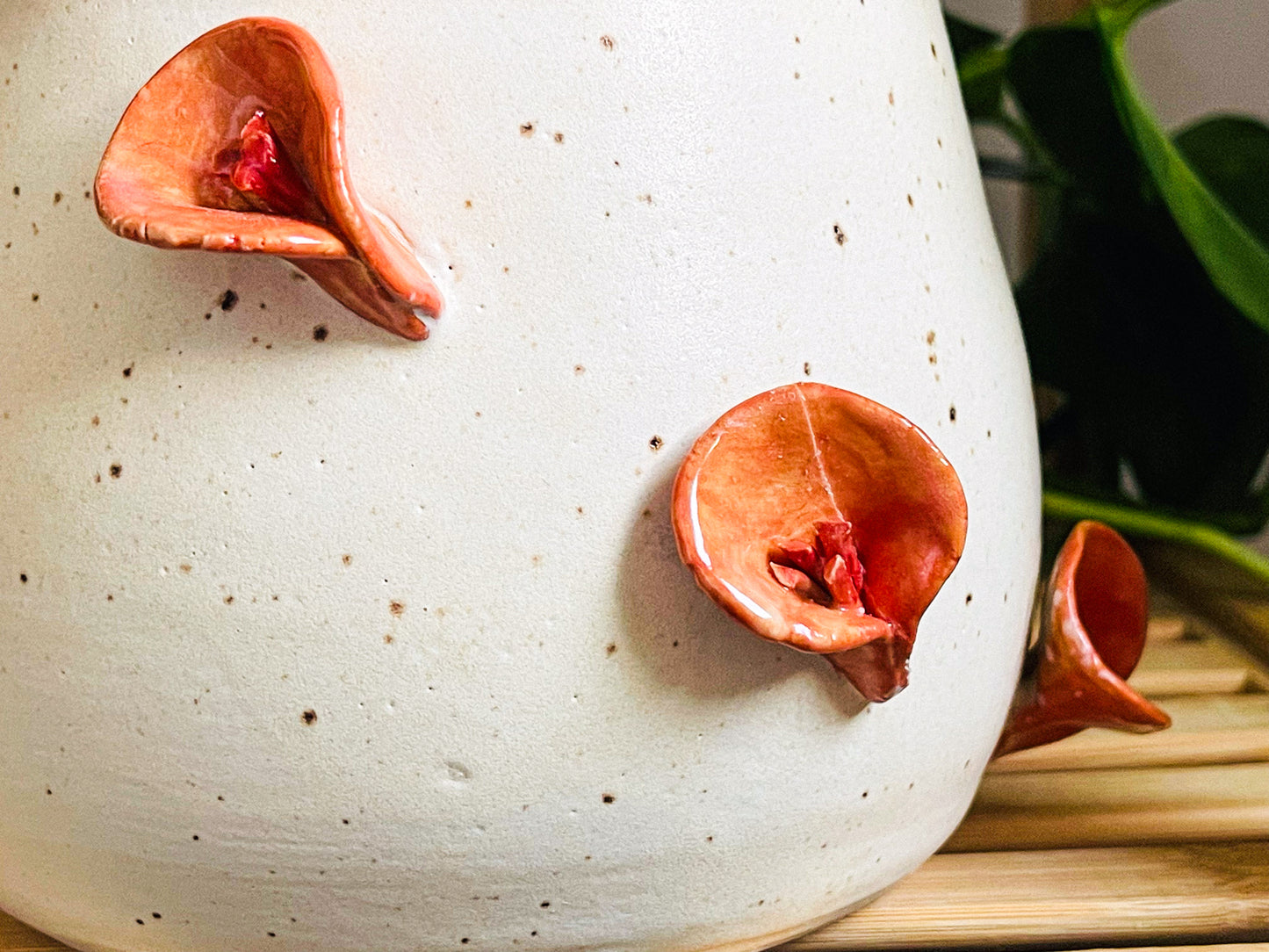 **vase: orange lillies