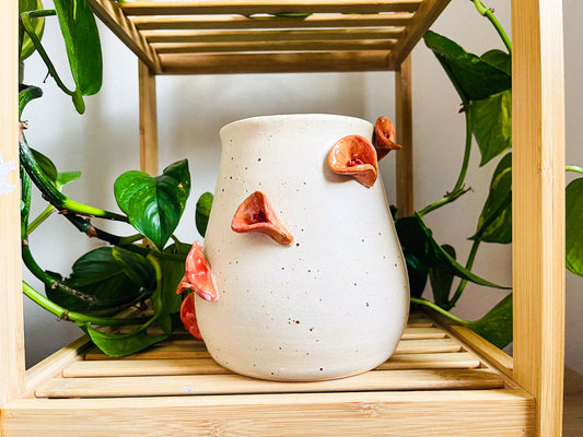 **vase: orange lillies