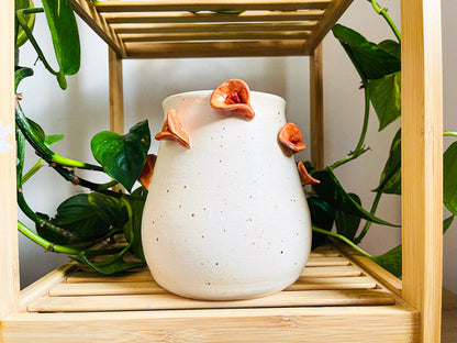 **vase: orange lillies