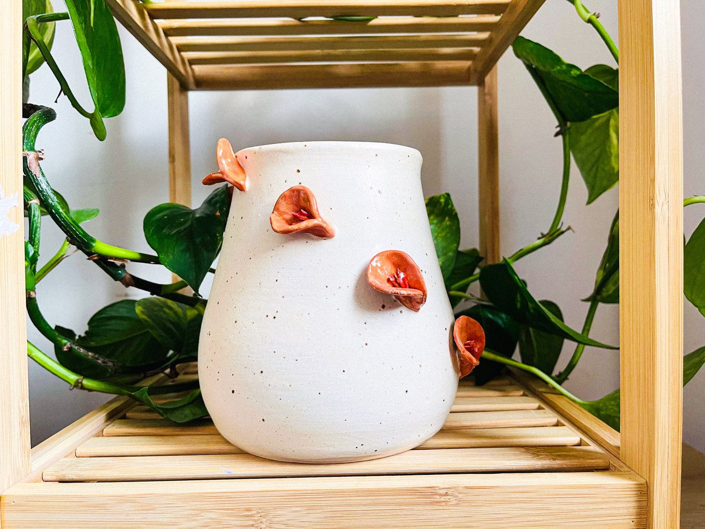 **vase: orange lillies