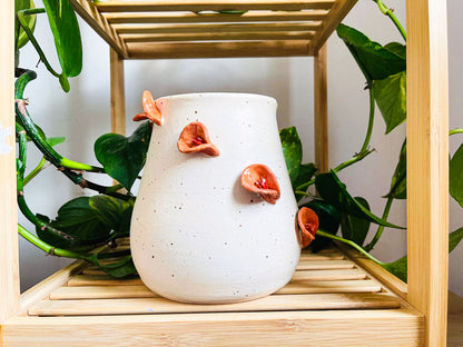 **vase: orange lillies