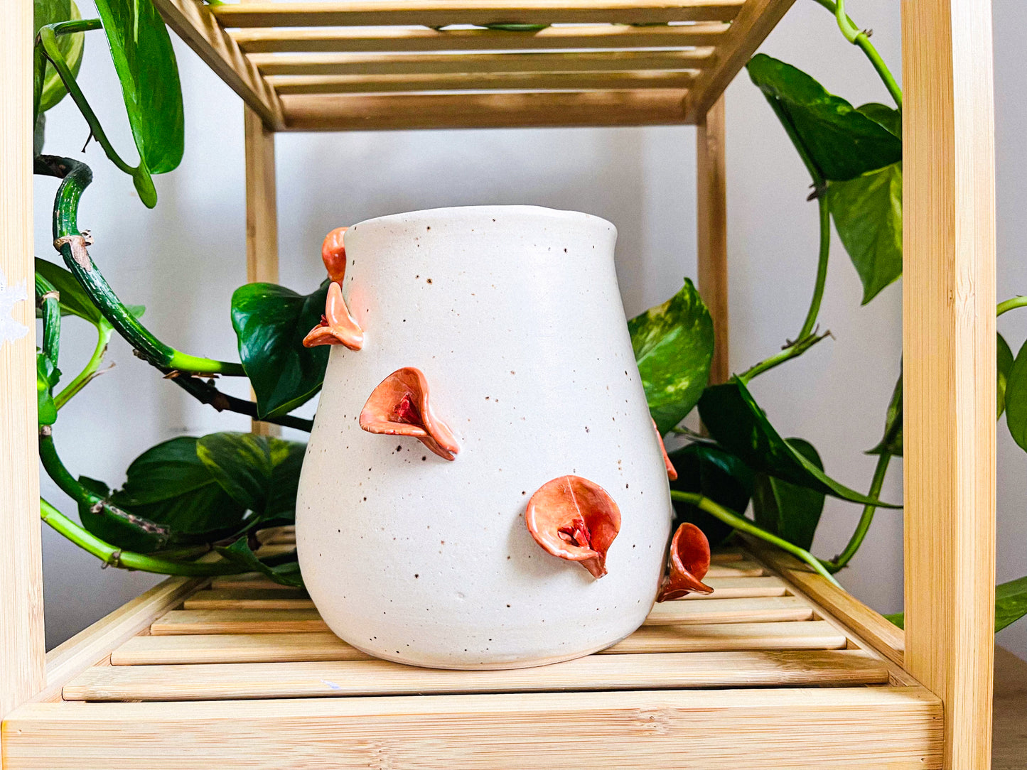 **vase: orange lillies