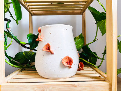 **vase: orange lillies