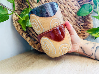 pair of carved cups
