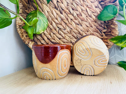 pair of carved cups