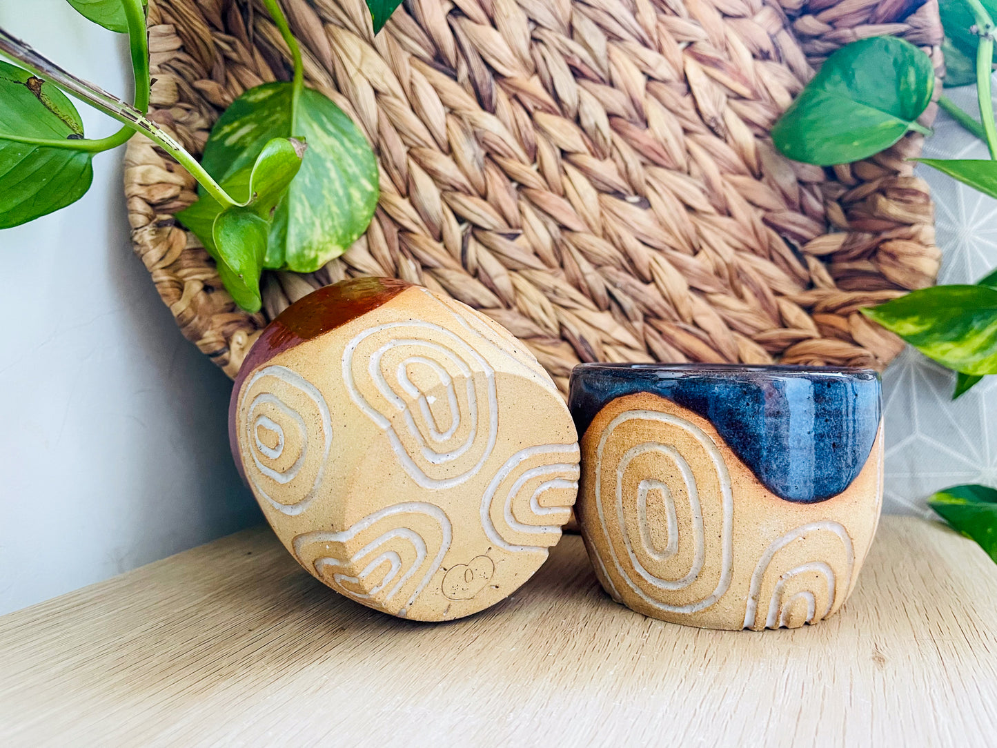 pair of carved cups