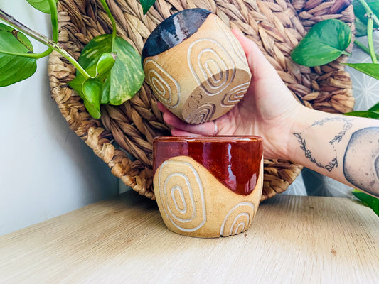 pair of carved cups