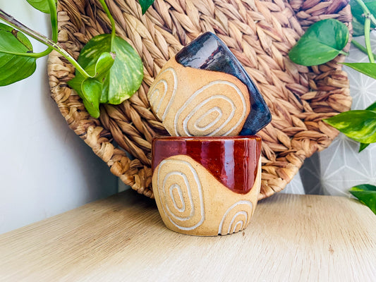 pair of carved cups